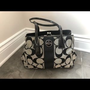 Coach purse, has some stains but can be cleaned